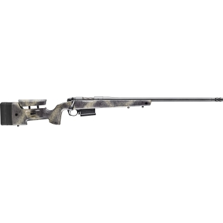 Camouflage-pattern sniper rifle shown in profile with a long barrel and detachable magazine on the underside rail area