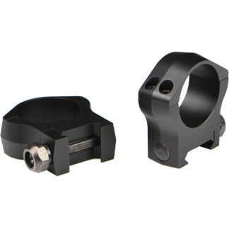 Pair of black clamp-style mounts for attaching a sight or scope, showing circular openings and mounting hardware pieces.