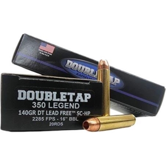 Two DoubleTap 350 Legend ammunition boxes with two copper cartridges in front.