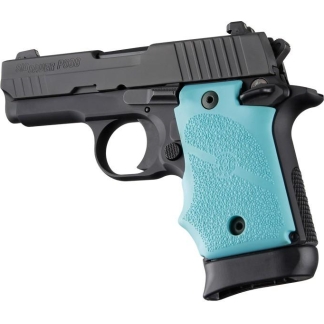 Side view of a black SIG Sauer P238 semi-automatic handgun with a light blue textured grip