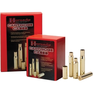 Two red Hornady cartridge cases boxes with several brass empty cartridge casings arranged beside them.
