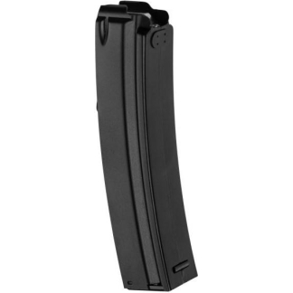 Black curved rifle magazine standing upright
