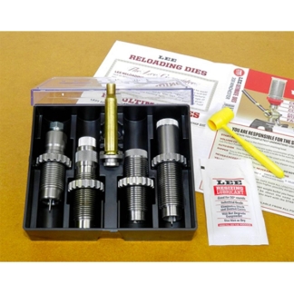 LEE reloading dies in a plastic case with lubricant packet and instructions on a wooden work surface.