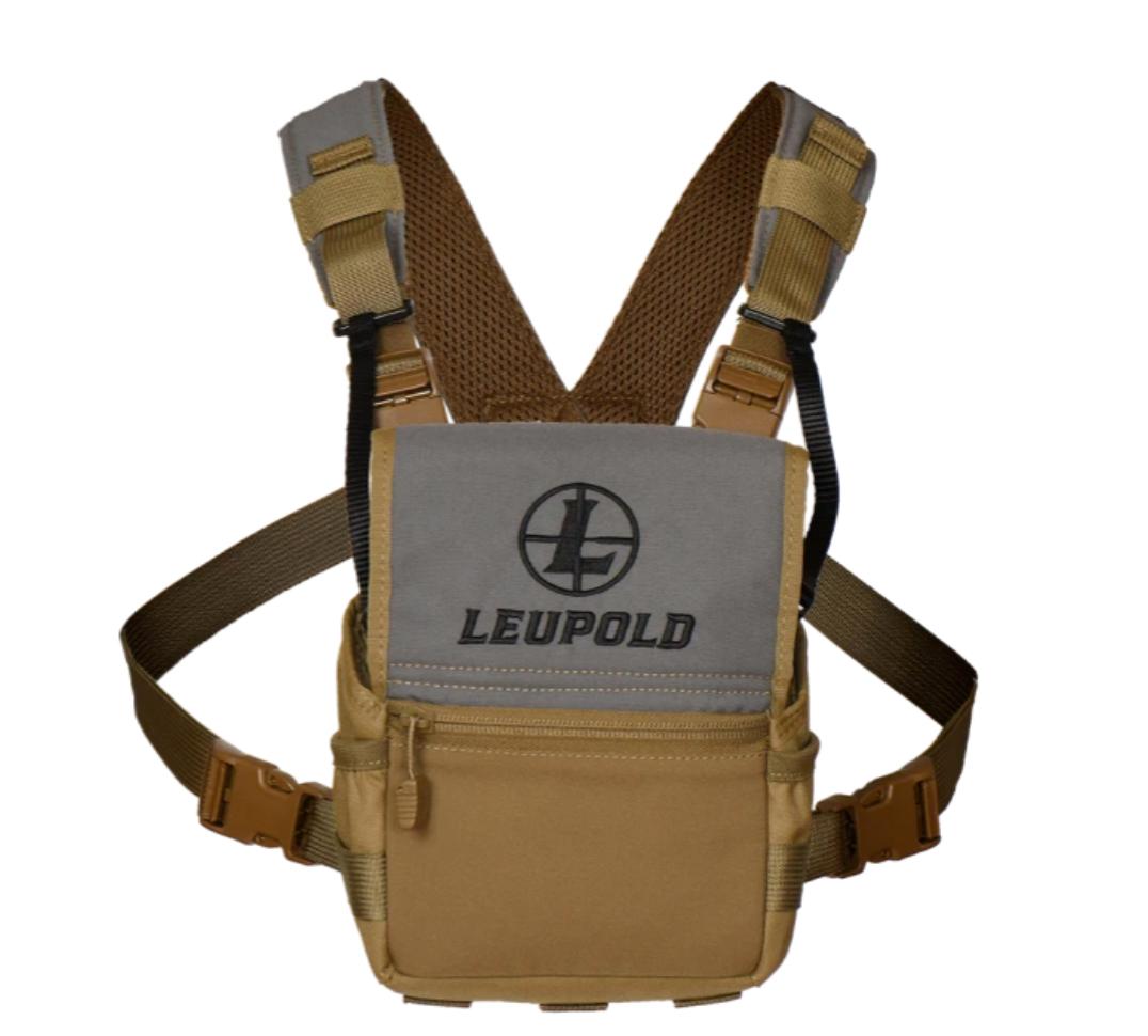 Screenshot | ATFirearms Tan and gray Leupold compact chest rig with adjustable shoulder straps and front zip pocket.