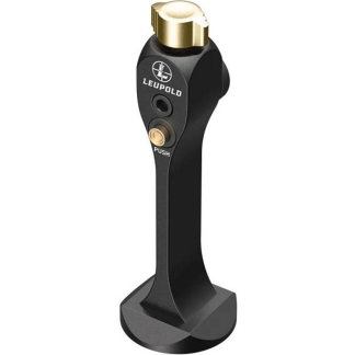 Leupold bore sight tool mounted on a black stand with a gold top adjustment knob labeled PUSH