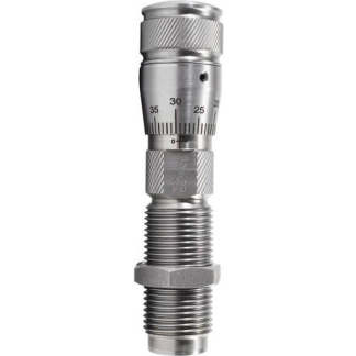 Close-up of a stainless steel precision micrometer with knurled thimble and spindle, used for precise measurements in metalworking.