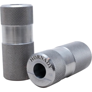 Two knurled metal spacers with a hollow center, standing and lying beside each other; brand Hornady visible on the front ring.