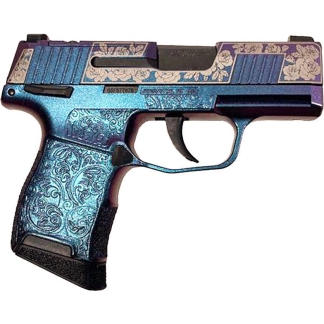 Decorative pistol with blue metallic finish and floral engravings, shown in profile