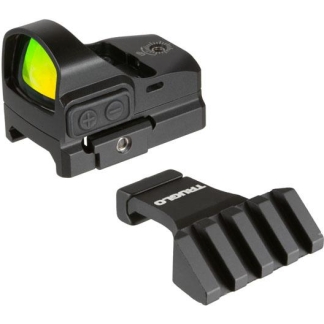 Compact black reflex red dot sight with a green-tinted lens, shown with its detachable mounting adapter for a firearm rail.