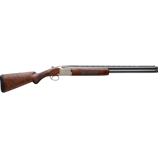 Double-barreled shotgun with carved walnut stock and engraved silver receiver.