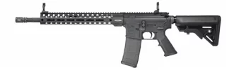 AR-15 style rifle with a long handguard and quad rails, curved magazine, and adjustable stock (black).