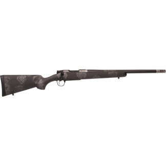 Long rifle with a dark floral-patterned stock and a long barrel, shown in profile.