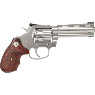 Side view of a silver revolver with a checkered wooden grip.