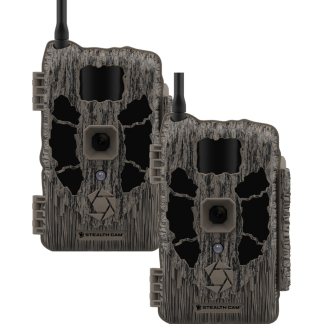 Two Stealth Cam trail cameras in bark camo finish, facing forward with lens and sensors visible.