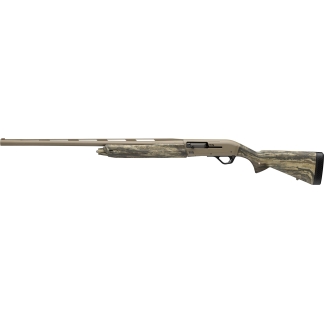 Side view of a long hunting rifle with tan finish and camo-pattern stock by the butt.