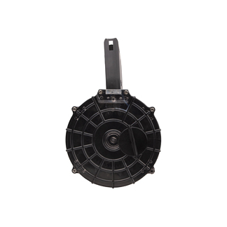 Round black mechanical component with a vertical mounting tab, resembling a flywheel or pulley.