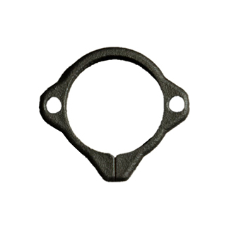 Ring-shaped metal gasket with two bolt holes and a bottom tab notch by the edge
