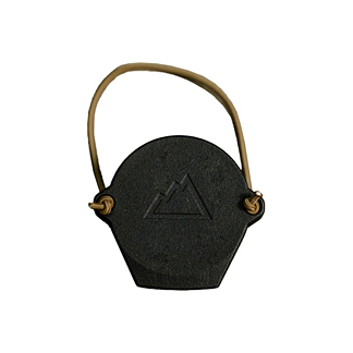 Black hexagonal pouch with a tan strap, embossed mountain logo on the front.