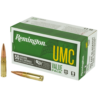 Remington UMC Value Pack box of 50 centerfire cartridges with two rifle bullets lying beside it.
