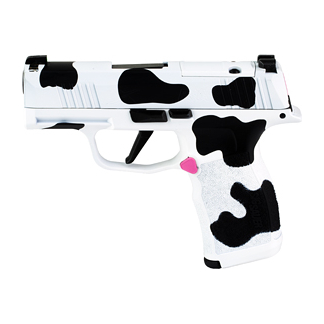 White cow-pattern toy pistol with black spots and pink trigger, isolated on white background.