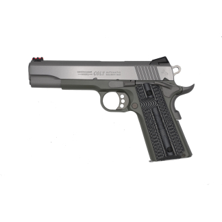 Side view of a Colt Government Model 9mm semi-automatic pistol with a silver slide and textured grip on a pale background.
