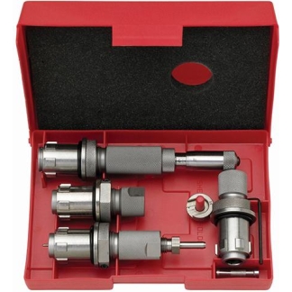 Red plastic tool case opened to reveal a metal socket set with multiple adapters and a T-handle style wrench designed for driving bits.