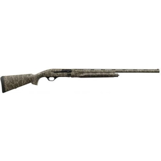 Side view of a camouflage-pattern hunting shotgun with a long barrel and wooden stock accessory cap, a firearm for hunting.